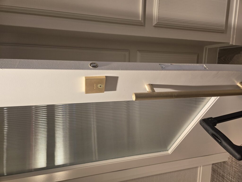 Residential door with gold lock hardware